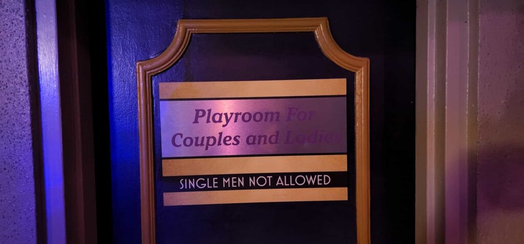 Rooftop Resort Review Couple and Ladies Playroom Sign
